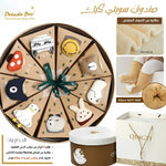 Sweetie Cake gift box for newborns designed like a cake with cotton baby socks inside a luxury box amman jordan